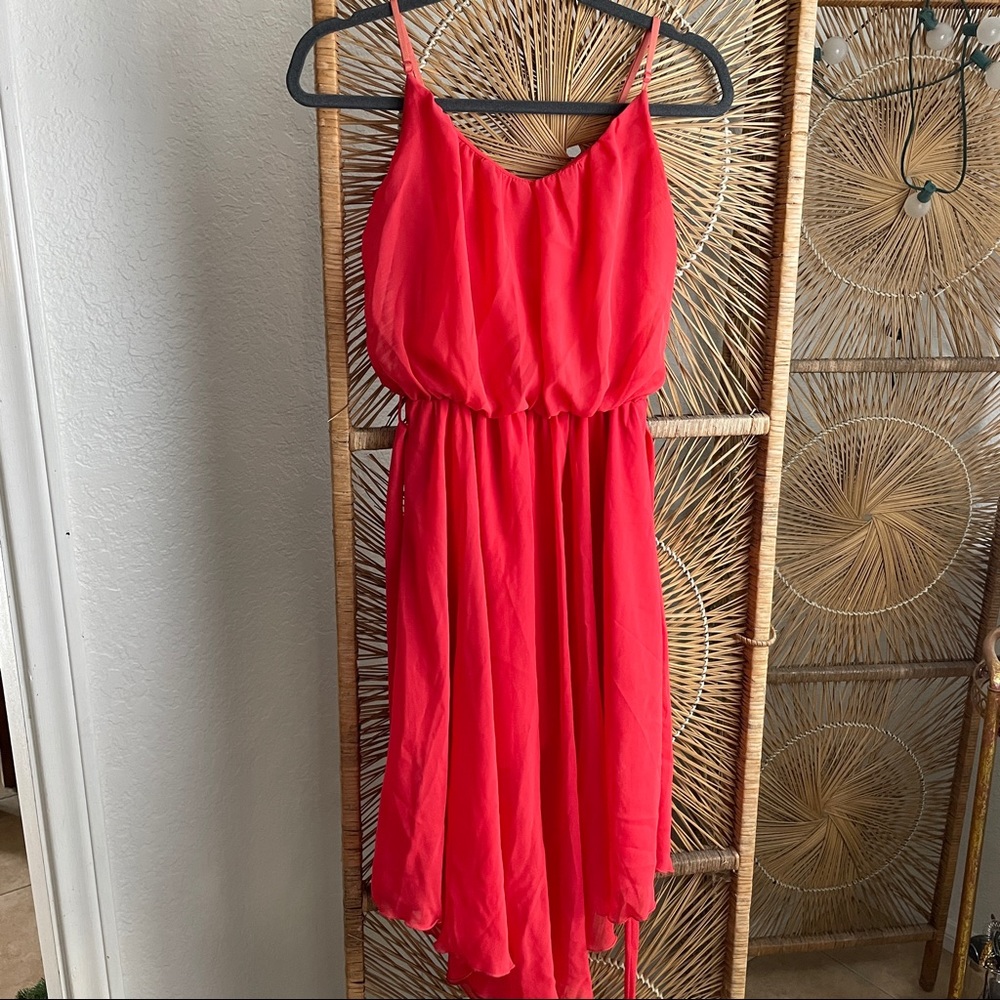 Flowy red spaghetti strap midi dress